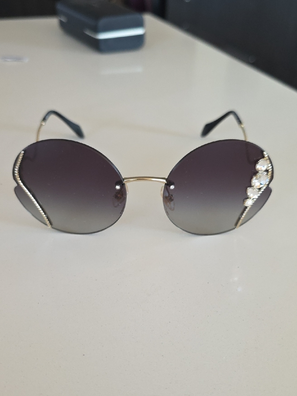 Miu Miu Gold Frame Funky Round Sunglasses with Dark Gradient Lenses and Crystal